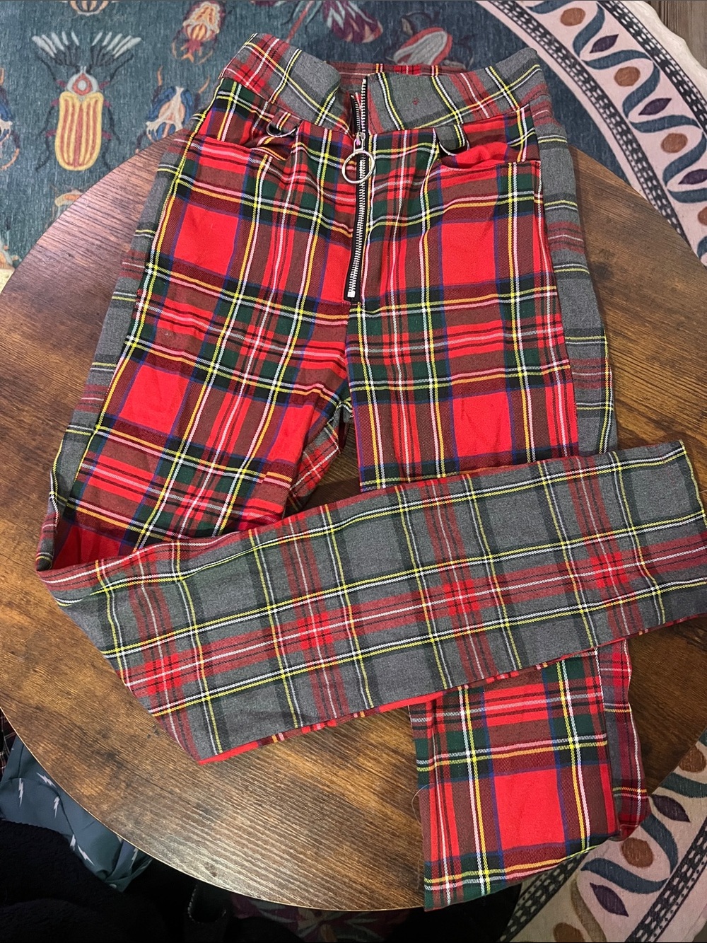Red, green and gray plaid pants with zipper detail
